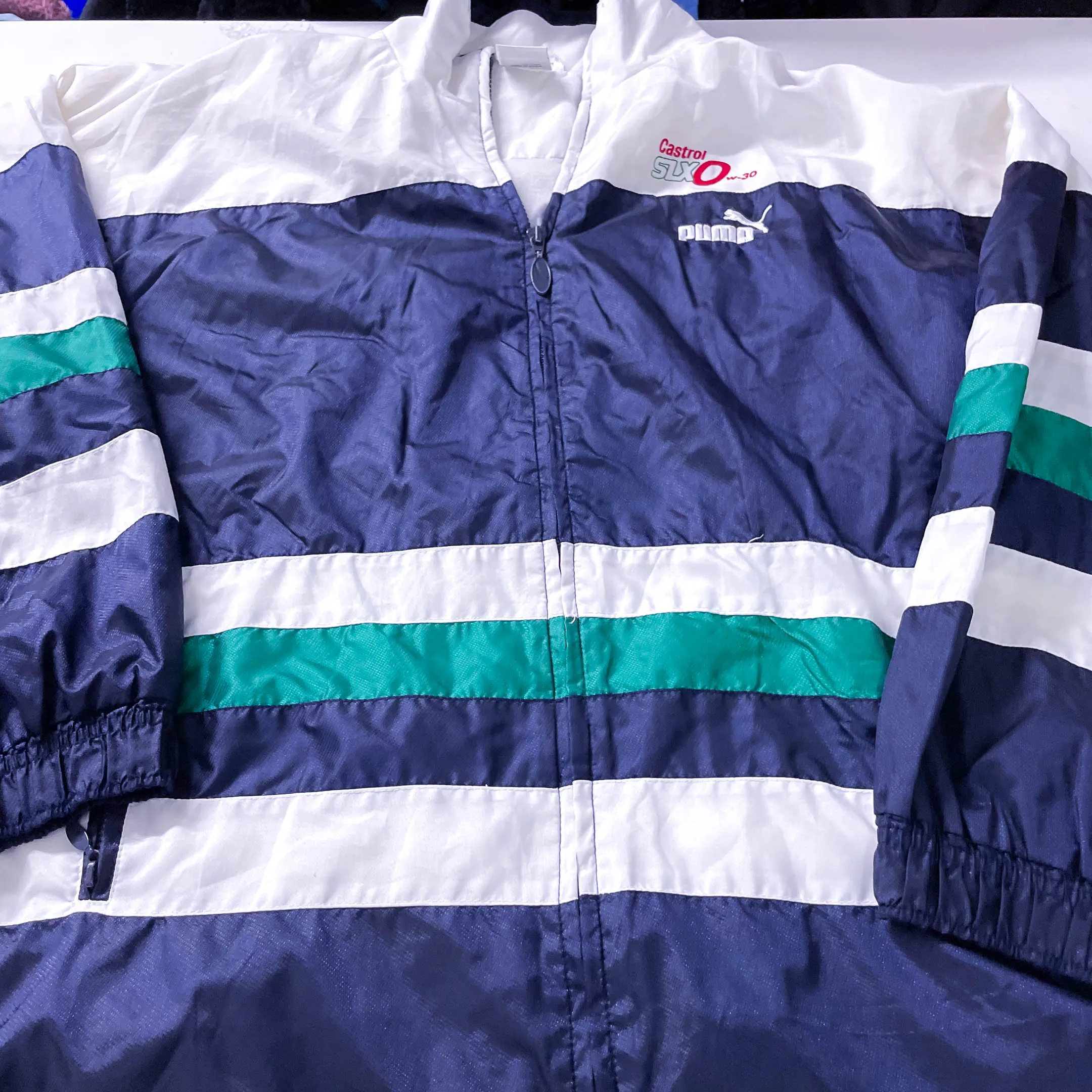 Vintage Men's Puma Castrol black multi stripe full zip jacket in S|L31 W22|SKU 3882